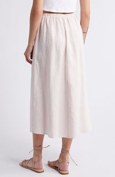 Fashioned with an easy elastic waist and handy pockets, this lightweight skirt made from airy linen is a warm-weather essential. 33" length Elastic waist Side-seam pockets 100% linen Machine wash, tumble dry Imported Relaxed Linen Maxi Skirt For Vacation, Feminine Relaxed Maxi Skirt For Beach, Feminine Relaxed Fit Maxi Skirt For The Beach, Feminine Maxi Skirt For Beach, Beach Midi-length Gathered Skirt, Midi Length Gathered Skirt For Beach, Relaxed Fit Midi Skirt For Daywear, Casual Linen Maxi Skirt For Beach, Linen Flowy Skirt For Vacation