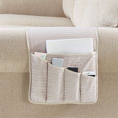 PRICES MAY VARY. 100% Polyester ORGANIZER WITH UNIQUE DESIGN: Light beige on both sides, with channel quilting, elegant, timeless and unique. Keep your accessories organized and protect your couch armrest against mess. Pets friendly. Made to enhance any decor. DURABLE AND COMFORTABLE: Premium quality of microfiber and extra soft fill, quilted with half inch delicate channel patterns, made to last. PERFECT FIT: Fit most sofa, couch, recliner, chair armrest. 5 pockets caddy designed for TV remote Bedside Caddy, Sofa Armrest, Remote Control Holder, Sofa Beige, Pocket Storage, Premium Sofa, Tv Remote Controls, Beige Sofa, Pocket Organizer