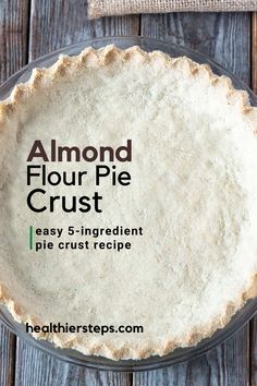 an uncooked pie crust with the words almond flour on top and below it