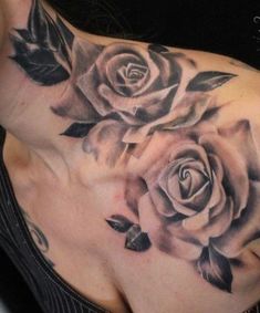 a woman's stomach with roses on it