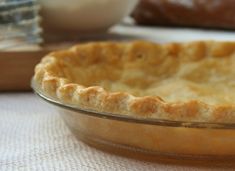 an uncooked pie sitting on top of a table