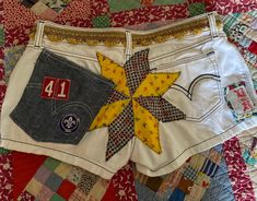 White Denim Upcycle Altered Patchwork Boy Scout Badges Levis Shorts 8 / 29 - Etsy Vintage White Jean Shorts, White Cotton Vintage Jean Shorts, Vintage White Cotton Jean Shorts, White Patchwork Shorts For Summer, Vintage White Cotton Shorts, White Patchwork Short Bottoms, Retro Cotton Patchwork Shorts, Retro Patchwork Cotton Shorts, Boy Scout Badges