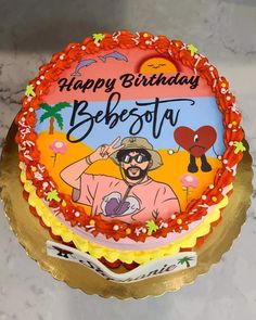 a birthday cake with an image of a man on it