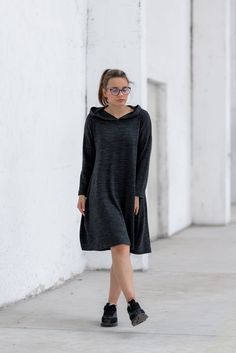 "Hooded Sweater Dress, Wool Winter Dress, Midi Flare Dress ◈ Stylish and chic fashion is our shared dream! You can be sure that this piece is made with a lot of love and craftsmanship.  ◈ S I Z I N G ◈ This item is available from XS to 4XL. Please, have a look at my Size Chart below before placing your order.  ◈ D E L I V E R Y ◈ This item will be shipped in up to 5 days after your order was placed.  We ship with a standard post or Express courier depending on your location. Please check our pol Hooded Stretch Dresses For Fall, Black Stretch Hooded Dress, Hooded Dresses For Fall Loungewear, Hooded Fall Dress For Loungewear, Hooded Loungewear Dress For Fall, Hooded Fall Loungewear Dress, Casual Hooded Loungewear Dress, Midi Flare Dress, Hooded Sweater Dress