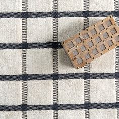 Lay the perfect foundation with this Rowena Emily Henderson x RugsUSA Area Rug. Its plaid design offers a clean, modern look, while adding warmth to your space! Rug measures 3 ft. in length x 5 ft. in height Crafted of 100% wool Grid plaid pattern Hues of white and blue Part of the Emily Henderson x RugsUSA collection Handwoven Rug pad not included Care: Vacuum regularly without beater bar. Blot spills with a mild detergent and clean cloth. Not safe for outdoor use. This item is available at Kirklands.com only, not available in stores. Please note: this item cannot be shipped to APO/FPO addresses. | Rowena Emily Henderson x RugsUSA Area Rug, 3x5, White/Blue, 3x5 , Wool | Kirkland's Home Winter Rug, Tan Rug, Space Rug, Wool Textures, Emily Henderson, Cotton Area Rug, Rugs Usa, Perfect Foundation, 8x10 Area Rugs