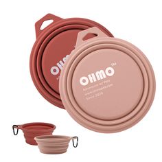 two red bowls and one pink bowl with the word omko on it