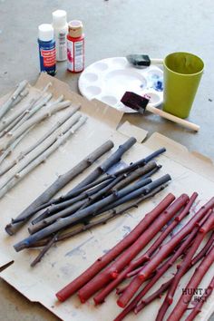 the tools are laying out on the table ready to be used for painting and decorating