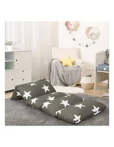 a bed with stars on it in a room