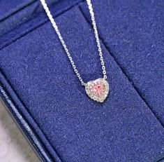 "Add a touch of elegance and glamour to your look with our stunning Pink Diamond Heart Necklace. Crafted with the finest materials, features a heart-shaped design encrusted with brilliant pink diamonds that sparkle and shine in the light. The necklace is made with high-quality materials to ensure durability and long-lasting wear. The pink diamonds are expertly cut and polished to enhance their natural beauty and brilliance. The heart-shaped design is classic and timeless, making this necklace pe Elegant Pink Heart Necklace For Wedding, Elegant Heart Gemstone Necklace For Wedding, Elegant Heart Necklace With Gemstone For Wedding, Elegant Pink Cubic Zirconia Heart Necklace, Elegant Heart Gemstone Necklace For Valentine's Day, Elegant White Gold Heart Necklace With Gemstone, Elegant Heart Necklace With Cubic Zirconia Gemstone, Elegant Heart Necklace With Cubic Zirconia, Luxury Diamond White Heart Necklace For Valentine's Day