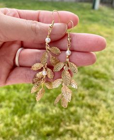 Beautiful handmade warm gold earrings with faux pearl details🌱 Perfect for a whimsical, boho, cottage core or woodland wedding! Super lightweight for comfortable all-day wear, and tiered designs has the perfect amount of movement for a night of dancing!🤍 Fishhook is nickel-free. Boho Cottage Core, Fairy Earrings, Whimsical Fairy, Fun Bracelet, Pearl Details, Boho Cottage, Whimsical Wedding, Woodland Wedding, Watch Necklace