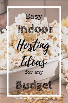 the words easy indoor hosting ideas for any budget on top of a bowl of popcorn