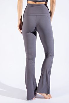 Always On Time Flared Yoga Pants These buttery soft flare style yoga pants feature a high rise, flared silhouette, and flattering seam detail throughout. Flared silhouette Yoga style pant Fabric Content: 84% Poly-Microfiber / 16% Spandex Fit: True to size Model is 5'9" and wearing size Small. Brand: Rae Mode Sizes: S: 0-4, M: 6-8, L: 10-12 *Online Exclusive* Silhouette Yoga, Yoga Pants Fit, Yoga Apparel, Flare Yoga Pants, Smoky Topaz, Buy List, Bottom Design, Buttery Soft Leggings, Beauty Inspo