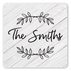 the smiths logo on a white wooden background