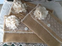 three pieces of burlock lace with flowers on them