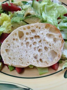 a close up of a plate of food with lettuce