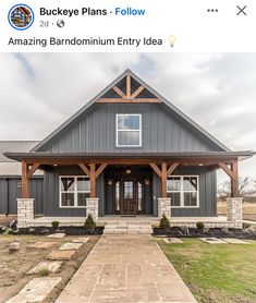 a gray house with an open front porch