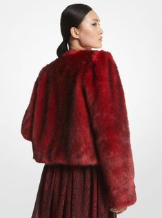 Finished in a swoon-worthy shade of scarlet, this eye-catching jacket will command any room. It’s cut in a cropped shape that layers easily, and is crafted from plush faux fur for extra warmth. Perfect over the season’s party dresses, it also makes for a glamorous daytime look paired with a T-shirt and jeans. Red Dress Fur, Short Faux Fur Coat, Michael Kors Faux Fur Vest, Faux Fur Cropped Jacket, T Shirt And Jeans, Cropped Jacket, Faux Fur Jacket, Faux Fur Coat, Crop Jacket