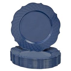 blue plates stacked on top of each other in front of a white background with no image