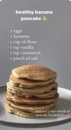 a stack of pancakes sitting on top of a white plate