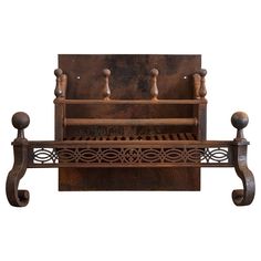 an old wooden bench with iron and wood handles