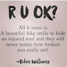 a black and white photo with a quote from robin williams on it that says, ru ok?