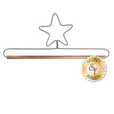 a star shaped metal hanger on a white background