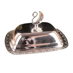 a silver tray with a swan on it