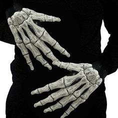 the skeleton hands are white and black