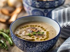 there is a bowl of soup on the table