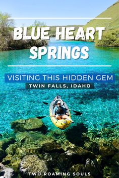 a person in a kayak on the water with text that reads blue heart springs visiting this hidden gems twin falls idaho