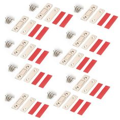 a bunch of red and white striped clips on top of each other in different sizes