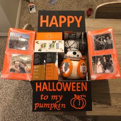 an open halloween box with pictures and other items in it that says happy halloween to my pumpkin friends