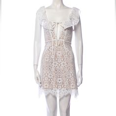 For Love & Lemons Shift Dress - Great Used Condition. White Shell With Beige Lining Lace Pattern Lace & Ruffle Accents Sleeveless With Square Neckline Concealed Zip Closure At Back Length From Top Of Triangle To Hem: 28” (Not Counting The Straps That Are Adjustable). Bust: 29”-34” ( Adjustable) Waist: 22” Hip: 31.25" Clothing Size: Xs Fabric: 50% Nylon, 40% Polyester, 10% Cotton; Lining 82% Nylon, 18% Spandex; Combo 55% Viscose, 45% Rayon Lemon Dress, For Love & Lemons, Love And Lemons, Lace Ruffle, Mini Shift Dress, Lace Pattern, For Love And Lemons, Square Neckline, Dresses Xs