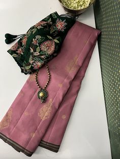 Veras allows us to channel our creativity through motifs, resulting in some of our most distinctive creations. Here is a wine maroon pure kanchipuram handwoven silk with pure zari buttas and floral motifs all through the body, beautifully set off with gold selvedge and a rich pallu. It's a classic palette, yet uniquely distinguished, bearing our unmistakable artistic imprint. Elegant Cotton Silk Saree With Intricate Embroidery, Festive Silk Saree With Motifs, Festive Silk Saree With Woven Motifs, Elegant Silk Saree With Woven Motifs, Everyday Saree, Luxury Silk Printed Saree, Pink Blouse Designs, Latest Blouse Designs Pattern