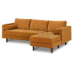 an orange couch and ottoman on a white background