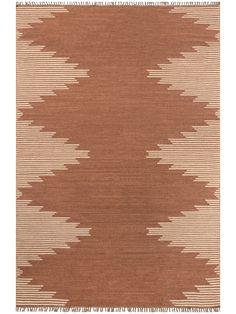 a brown and white rug with fringes on it