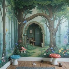 a room with a mural on the wall and two mushroom stools in front of it