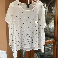 Never Worn H&M Shirt! Super Cute Sheer Blouse For The Holidays! The Front Has Cute Little Sequins But The Back Is Plain. H&m Shirts, Sheer Blouse, Shirt Color, The Back, Colorful Shirts, H&m, Color White, Size 2, Top Blouse