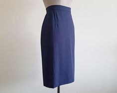 Vintage Navy Blue Straight Skirt - Label : MISSONI DONNA  - Fabric : 50% wool 50% viscose  - Nylon zipper on the back - Lined - Made in Italy - Very good vintage condition Measurements :  Waist : 27" Hips : 39" Total length : 24.5"  Our products are vintage clothing that will be cleaned so you can be confident in the quality. We carefully inspect each garment to make sure that you get the most accurate and informed description possible. We do our best to state any imperfections in the listing. If a flaw accidentally escapes our inspection, please let me know as soon as possible and we will be happy to help remedy the situation. Please read the product description carefully before purchasing to ensure it meets your needs. If you have any questions, please feel free to contact us. Thank you Viscose Skirt, Skirt Straight, Skirt Vintage, Wool Skirt, Straight Skirt, Wool Skirts, Blue Wool, Knee Length Skirt, Vintage Skirt