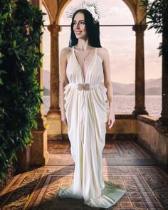 This ethereal white unisize evening gown, perfect for weddings and special occasions, channels the grace and power of Athena herself. Crafted from the finest latex, the gown drapes like heavenly silk, creating an enchanting silhouette that evokes Grecian beauty. The toga-inspired wrap design adds a touch of classical sophistication, allowing you to effortlessly radiate grace and poise. The cinched waist, adorned with an elegant belt, enhances your figure with divine simplicity. The "Athena's Rad Grecian Dress Ancient, Ancient Greek Style Dress, Ancient Greek Robes, White Grecian Dress, White Ancient Greek Dress, Elegant Belt, Greek Clothing, Dress With Belt, Greek Goddess