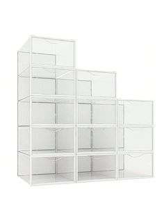 three white shelving units sitting next to each other