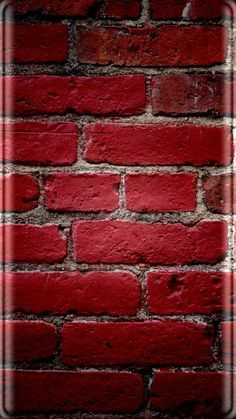 a red brick wall is shown in this image