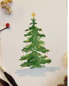 a painting of a christmas tree is being worked on