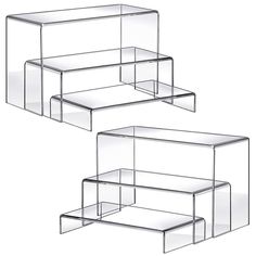 two clear acrylic boxes sitting side by side on top of each other in front of a white background