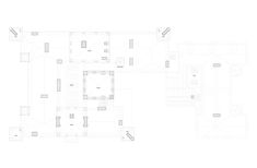 the floor plan for an apartment building with several rooms and two floors, all in white