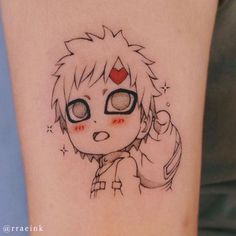 an anime character tattoo on the arm with glasses and a heart in her eyes is shown