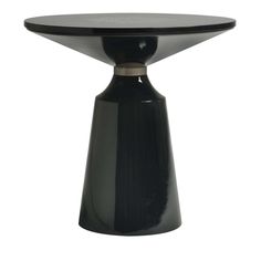 a black table with an oval top and metal base on the bottom, against a white background