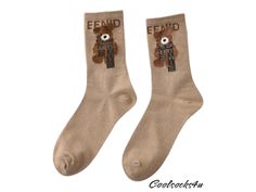 Discover the perfect blend of nostalgia and style with our Beige Teddy Bear Cozy Crew Socks! 🌟 These socks are more than just a cozy accessory; they are a statement of fun and retro charm. Crafted with a combination of quality materials, these socks promise both comfort and durability, making them a must-have addition to your wardrobe. 🧸 **Unique Design Adorned with adorable teddy bear motifs, these socks are perfect for adding a touch of cuteness to any outfit. 🧦 **Ultimate Comfort Made from Teddy Bear Patterns, Beige Teddy Bear, Bear Patterns, Cute Gifts For Friends, Cozy Accessories, Teddy Bear Pattern, Patterned Socks, Bear Pattern, Cool Socks