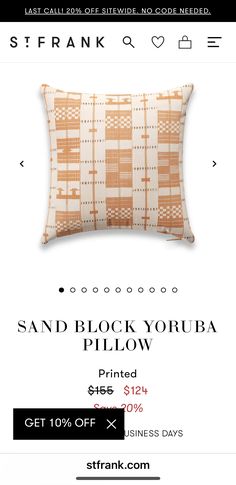 an orange and white pillow is on sale