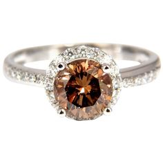 1.78 Carat Natural Fancy Vivid Orange Brown Diamond Ring 18 Karat | From a unique collection of vintage Solitaire Rings at https://www.1stdibs.com/jewelry/rings/solitaire-rings/. Orange Diamond Ring With Prong Setting, Brown Prong Set Ring For Anniversary, Brown Prong-set Ring For Anniversary, Elegant Brown Diamond Ring, Brown Rings With Prong Setting For Anniversary, Brown Round Diamond Ring In Fine Jewelry Style, Brown Diamond Ring With Diamond Accents For Anniversary, Brown Diamond Ring In Fine Jewelry Style, Brown Diamond Ring With Accents For Anniversary